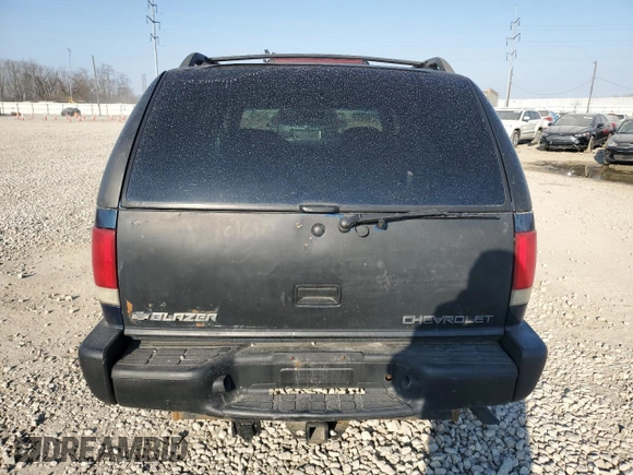 2000 Chevrolet Blazer LT z VIN 1GNDT13W9Y2135306, wystawiony jako Copart lot #47902155 z przebiegiem 152 008 mil mil oraz Szkoda całkowita • Salvage title. Historia ofert i sprzedaży dostępna na DreamBid. Obrazek 6.