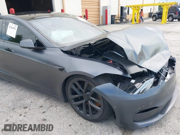 2023 Tesla Model S with VIN 5YJSA1E54PF501565, listed as a IAAI auction lot 42244953 with Not provided miles and . Bid and sale history available at DreamBid. Image 18.