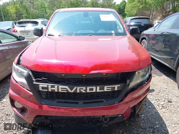 2018 Chevrolet Colorado 4WD LT z VIN 1GCGTCENXJ1214811, wystawiony jako IAAI lot #42418878 z przebiegiem 80 453 mil mil oraz . Historia ofert i sprzedaży dostępna na DreamBid. Obrazek 12.