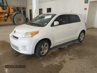 2008 Scion xD with VIN JTKKU10488J002731, listed as a IAAI auction lot 41767986 with 217,135 mi miles. Bid and sale history available at carsss.com. Image 2.