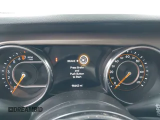 2020 Jeep Wrangler Unlimited Sport S z VIN 1C4HJXDG6LW241594, wystawiony jako IAAI lot #42045756 z przebiegiem 98 642 mil mil oraz . Historia ofert i sprzedaży dostępna na DreamBid. Obrazek 7.