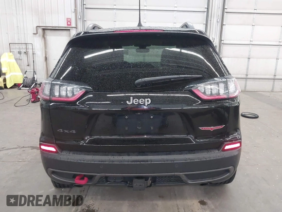 2019 Jeep Cherokee Trailhawk with VIN 1C4PJMBX9KD456748, listed as a IAAI auction lot 42367186 with 91,665 mi miles and . Bid and sale history available at DreamBid. Image 16.