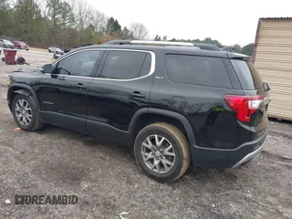 2021 GMC Acadia SLT with VIN 1GKKNMLS0MZ209789, listed as a IAAI auction lot 41521978 with 104,690 mi miles. Bid and sale history available at carsss.com. Image 3.