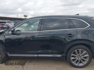 2023 Mazda CX-9 Grand Touring with VIN JM3TCBDY2P0632239, listed as a IAAI auction lot 41543302 with 56,603 mi miles and . Bid and sale history available at carsss.com. Image 15.