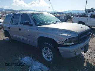 1998 Dodge Durango z VIN 1B4HS28Y1WF132982, wystawiony jako IAAI lot #41890256 z przebiegiem 112 690 mil mil oraz . Historia ofert i sprzedaży dostępna na DreamBid. Obrazek 1.