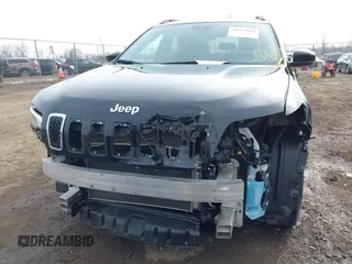2022 Jeep Cherokee Latitude Lux z VIN 1C4PJLMX3ND510914, wystawiony jako IAAI lot #41824087 z przebiegiem 80 515 mil mil oraz . Historia ofert i sprzedaży dostępna na DreamBid. Obrazek 6.