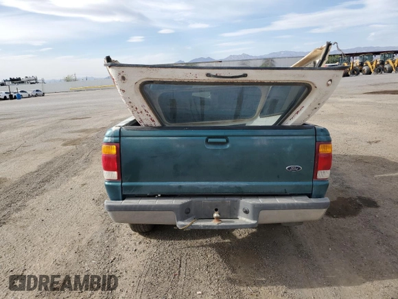 1998 Ford Ranger XL with VIN 1FTYR10C6WUC52233, listed as a Copart auction lot 56231925 with 198,687 mi miles and Salvage title. Bid and sale history available at DreamBid. Image 6.