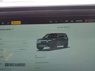 2023 Rivian R1S Adventure z VIN 7PDSGABA8PN020504, wystawiony jako IAAI lot #42025341 z przebiegiem 5989 mil mil oraz . Historia ofert i sprzedaży dostępna na DreamBid. Obrazek 7.