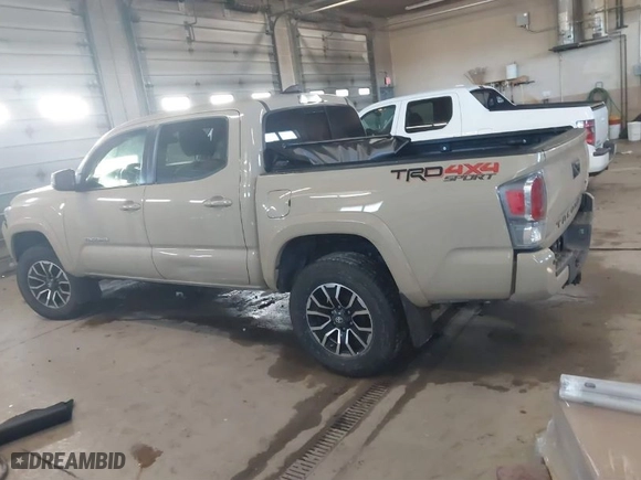2020 Toyota Tacoma 4WD SR5 with VIN 3TMCZ5AN1LM318866, listed as a IAAI auction lot 41619290 with 69,973 mi miles. Bid and sale history available at carsss.com. Image 3.