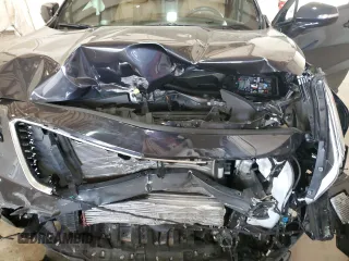 2023 Cadillac XT4 AWD Sport z VIN 1GYFZFR41PF103650, wystawiony jako Copart lot #59321355 z przebiegiem 27 092 mil mil oraz Szkoda całkowita • Salvage title. Historia ofert i sprzedaży dostępna na DreamBid. Obrazek 11.