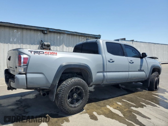 2020 Toyota Tacoma SR5 z VIN 3TMDZ5BN0LM094976, wystawiony jako Copart lot #58695515 z przebiegiem 84 025 mil mil oraz Czysty tytuł • Clean title. Historia ofert i sprzedaży dostępna na DreamBid. Obrazek 3.