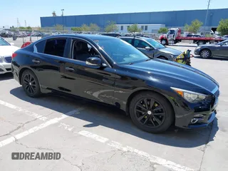 2015 Infiniti Q50 Premium z VIN JN1BV7AP7FM350924, wystawiony jako IAAI lot #42714037 z przebiegiem 100 818 mil mil oraz . Historia ofert i sprzedaży dostępna na DreamBid. Obrazek 1.