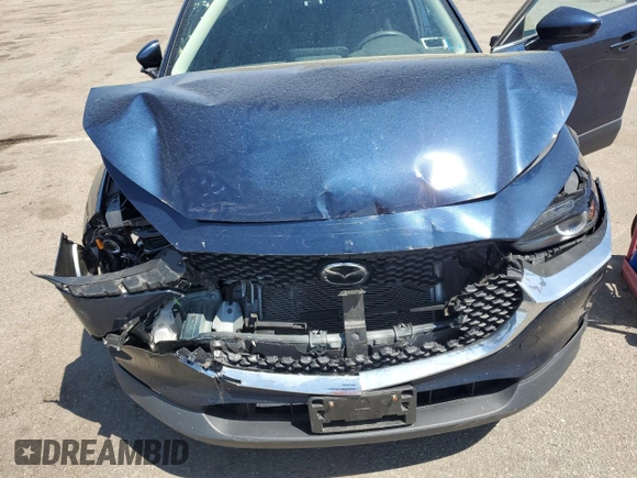 2022 Mazda CX-30 S Select z VIN 3MVDMBBL6NM452823, wystawiony jako Copart lot #55104745 z przebiegiem 20 614 mil mil oraz Szkoda całkowita • Salvage title. Historia ofert i sprzedaży dostępna na DreamBid. Obrazek 12.
