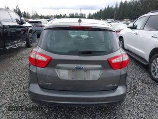 2013 Ford C-Max SE z VIN 1FADP5AU7DL511937, wystawiony jako IAAI lot #41909936 z przebiegiem 165 061 mil mil oraz . Historia ofert i sprzedaży dostępna na DreamBid. Obrazek 16.