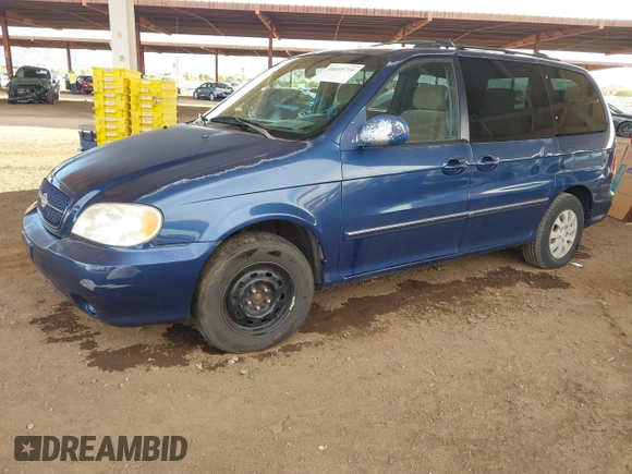 2005 Kia Sedona LX with VIN KNDUP132X56697388, listed as a IAAI auction lot 40695710 with 217,116 mi miles. Bid and sale history available at carsss.com. Image 2.