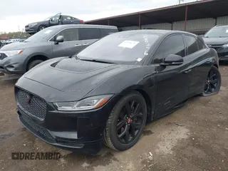 2020 Jaguar I-Pace SE with VIN SADHC2S14L1F80256, listed as a IAAI auction lot 42055674 with 48,694 mi miles and . Bid and sale history available at DreamBid. Image 2.