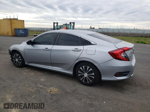 2019 Honda Civic Sedan LX with VIN 19XFC2F61KE200100, listed as a Copart auction lot 37959484 with 131,847 mi miles and Salvage Title. Bid and sale history available at carsss.com. Image 2.