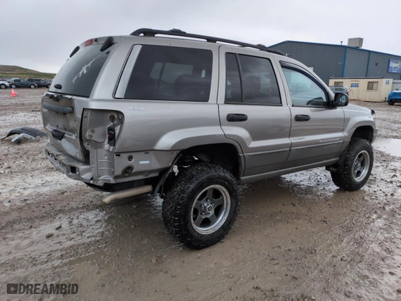 1999 Jeep Grand Cherokee Laredo with VIN 1J4GW58SXXC553547, listed as a Copart auction lot 50786405 with 151,968 mi miles and Salvage Title. Bid and sale history available at carsss.com. Image 3.
