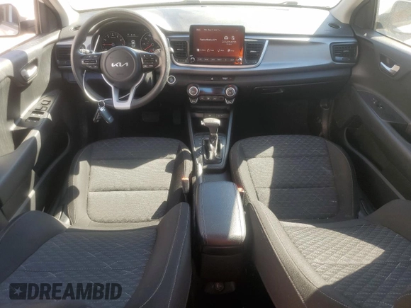 2022 Kia Rio LX with VIN 3KPA24AD5NE432475, listed as a Copart auction lot 42524575 with 18,593 mi miles and Salvage Title. Bid and sale history available at DreamBid. Image 8.