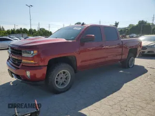 2018 Chevrolet Silverado 1500 LT with VIN 3GCUKREC5JG203272, listed as a Copart auction lot 61239994 with 82,485 mi miles and Salvage Title. Bid and sale history available at carsss.com. Image 1.