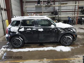 2014 MINI Countryman S with VIN WMWZC5C57EWP39161, listed as a IAAI auction lot 41342912 with 108,459 mi miles and . Bid and sale history available at DreamBid. Image 13.