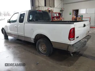 2003 Ford F-150 XL with VIN 1FTRX17W13NB80440, listed as a IAAI auction lot 41460037 with 1 mi miles. Bid and sale history available at carsss.com. Image 3.