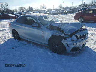 2016 BMW 2 Series M235i xDrive with VIN WBA1J9C50GV372199, listed as a Copart auction lot 87229084 with 0 mi miles and Salvage Title. Bid and sale history available at carsss.com. Image 4.