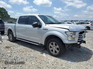 2015 Ford F-150 XL with VIN 1FTEW1CF3FFA48558, listed as a Copart auction lot 62067385 with 151,014 mi miles and Salvage title. Bid and sale history available at DreamBid. Image 4.