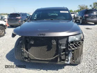 2017 Jeep Grand Cherokee 75th Anniversary with VIN 1C4RJEAG4HC700191, listed as a Copart auction lot 52520655 with 130,828 mi miles and Salvage title. Bid and sale history available at DreamBid. Image 5.