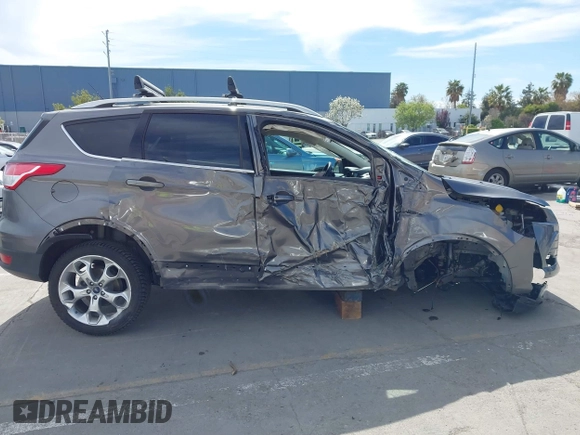 2013 Ford Escape Titanium with VIN 1FMCU0J91DUD39570, listed as a IAAI auction lot 42014892 with 55,184 mi miles and . Bid and sale history available at DreamBid. Image 13.