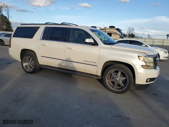2015 Chevrolet Suburban LT with VIN 1GNSKJKC2FR638780, listed as a Copart auction lot 47360345 with 156,884 mi miles and Salvage Title. Bid and sale history available at carsss.com. Image 4.