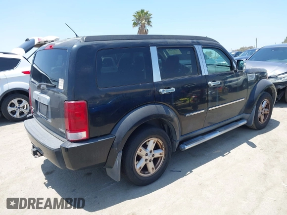 2007 Dodge Nitro SLT z VIN 1D8GT58K27W578490, wystawiony jako IAAI lot #42335125 z przebiegiem 125 826 mil mil oraz . Historia ofert i sprzedaży dostępna na DreamBid. Obrazek 4.