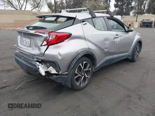 2018 Toyota C-HR XLE with VIN JTNKHMBX5J1011568, listed as a IAAI auction lot 42043867 with 30,699 mi miles. Bid and sale history available at carsss.com. Image 4.