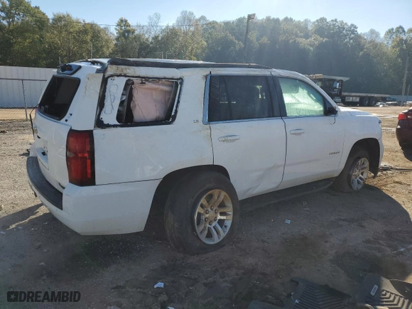 2015 Chevrolet Tahoe LS with VIN 1GNSKAKCXFR546803, listed as a Copart auction lot 81128974 with 131,482 mi miles and Salvage Title. Bid and sale history available at carsss.com. Image 3.