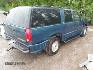 1995 GMC Suburban with VIN 1GDFK16K8SJ741041, listed as a IAAI auction lot 42315676 with 159,312 mi miles and . Bid and sale history available at DreamBid. Image 4.