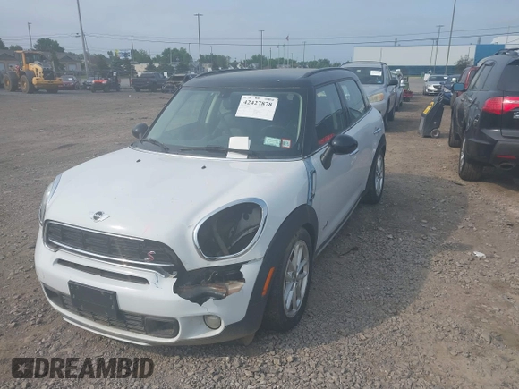 2015 MINI Countryman S with VIN WMWZC5C59FWM18935, listed as a IAAI auction lot 42427878 with 121,410 mi miles and . Bid and sale history available at DreamBid. Image 2.