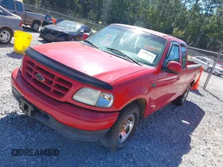 2000 Ford F-150 XL with VIN 1FTZX1720YNB27491, listed as a IAAI auction lot 41469775 with 108,243 mi miles. Bid and sale history available at carsss.com. Image 2.