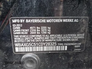 2012 BMW 5 Series 528i with VIN WBAXG5C51CDY28325, listed as a IAAI auction lot 41348221 with 125,039 mi miles. Bid and sale history available at carsss.com. Image 9.