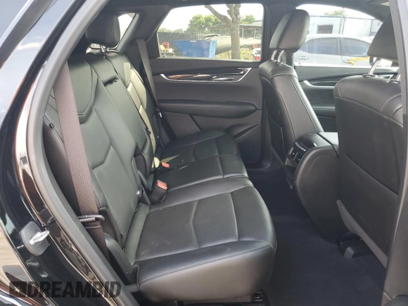 2022 Cadillac XT5 FWD Premium Luxury z VIN 1GYKNCRS7NZ101131, wystawiony jako Copart lot #56365065 z przebiegiem 74 168 mil mil oraz Szkoda całkowita • Salvage title. Historia ofert i sprzedaży dostępna na DreamBid. Obrazek 11.
