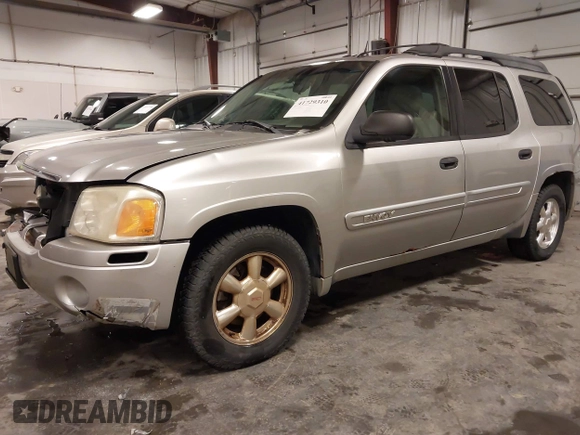 2005 GMC Envoy SLE with VIN 1GKET16S656102522, listed as a IAAI auction lot 41729310 with 233,049 mi miles. Bid and sale history available at carsss.com. Image 21.