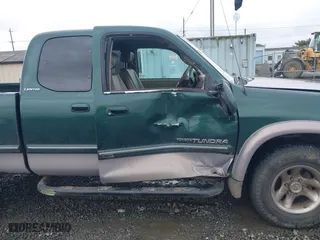 2000 Toyota Tundra Limited with VIN 5TBBT4812YS031675, listed as a IAAI auction lot 41626727 with 257,195 mi miles. Bid and sale history available at carsss.com. Image 6.