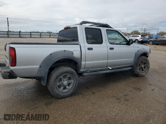 2002 Nissan Frontier SE with VIN 1N6ED27T92C379360, listed as a Copart auction lot 51235495 with 230,598 mi miles and Salvage title. Bid and sale history available at DreamBid. Image 3.