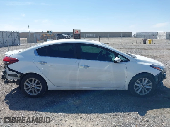 2017 Kia Forte S with VIN 3KPFL4A71HE086412, listed as a IAAI auction lot 42004117 with 201,729 mi miles and . Bid and sale history available at DreamBid. Image 14.