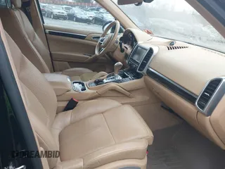 2016 Porsche Cayenne with VIN WP1AA2A28GLA06519, listed as a IAAI auction lot 41520326 with 144,828 mi miles. Bid and sale history available at carsss.com. Image 5.