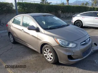 2014 Hyundai Accent GLS with VIN KMHCT4AE5EU597728, listed as a IAAI auction lot 41401782 with 121,926 mi miles. Bid and sale history available at carsss.com. Image 1.