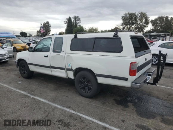 1995 Toyota T100 SR5 with VIN JT4VD12F8S0007489, listed as a Copart auction lot 82177794 with 290,145 mi miles and Clean Title. Bid and sale history available at DreamBid. Image 2.