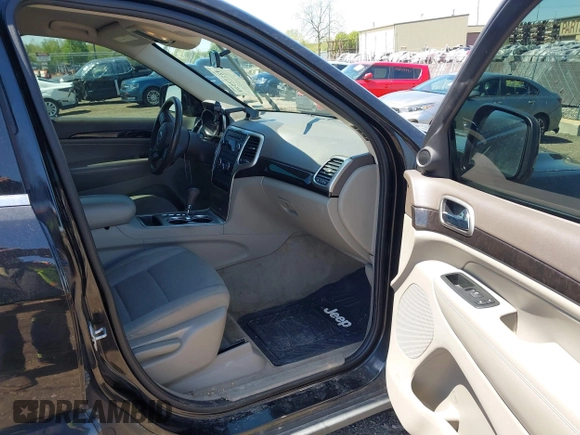 2011 Jeep Grand Cherokee Laredo with VIN 1J4RR4GGXBC546727, listed as a IAAI auction lot 42232520 with 268,616 mi miles and . Bid and sale history available at DreamBid. Image 5.