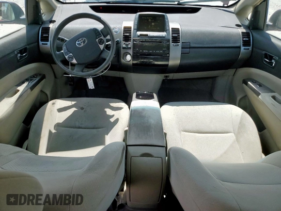 2007 Toyota Prius with VIN JTDKB20U073279587, listed as a Copart auction lot 62498535 with 169,677 mi miles and Clean title. Bid and sale history available at DreamBid. Image 8.