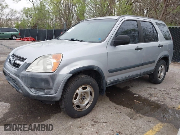 2002 Honda CR-V LX with VIN JHLRD68422C015173, listed as a IAAI auction lot 41959037 with 217,058 mi miles and . Bid and sale history available at carsss.com. Image 2.