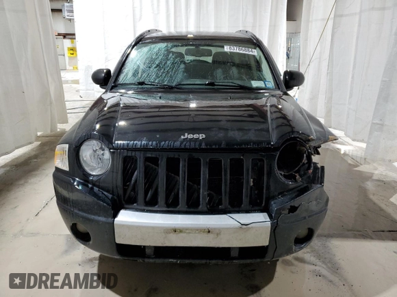 2007 Jeep Compass Limited with VIN 1J8FF57W77D241355, listed as a Copart auction lot 83786884 with 241,742 mi miles and Salvage Title. Bid and sale history available at carsss.com. Image 5.